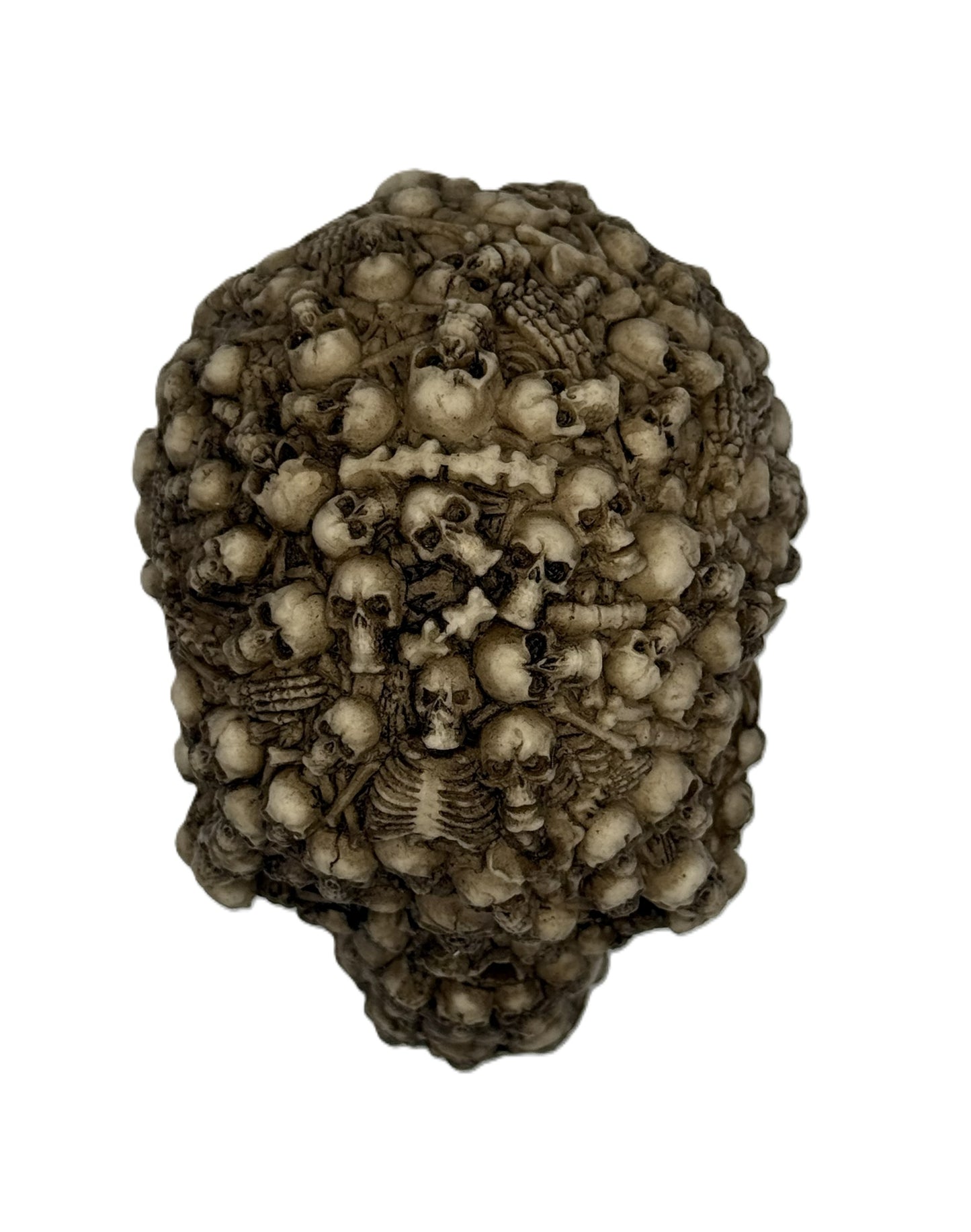Top view of multi skull statue highlighting clustered skulls and skeletal details in antique bone finish