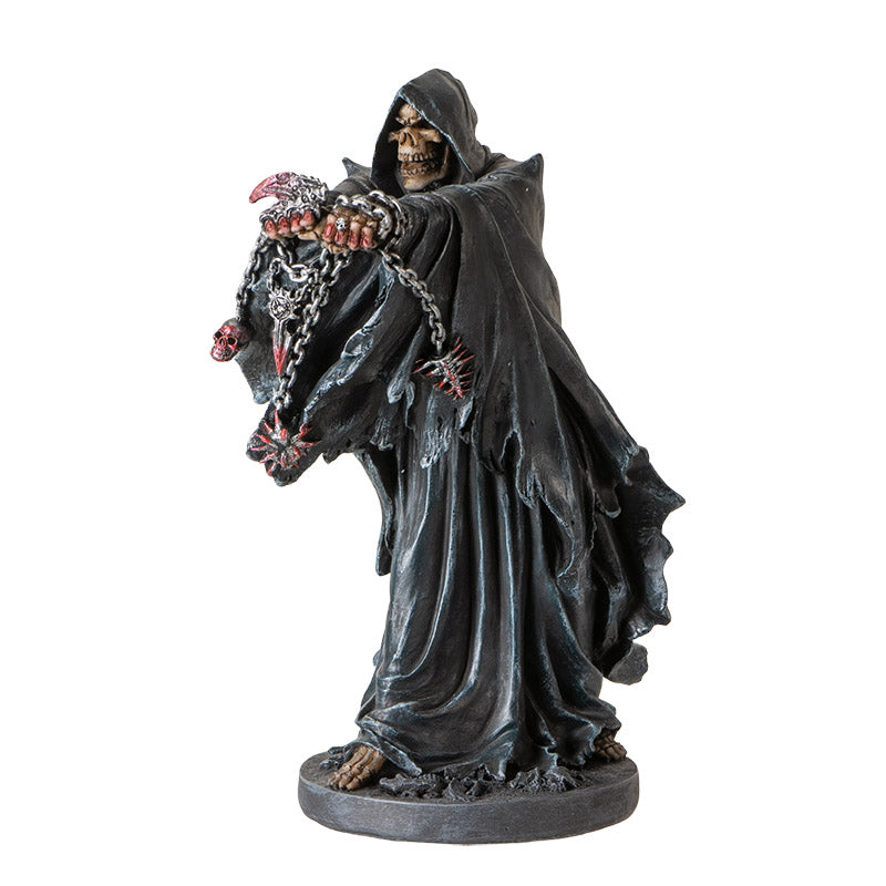 Angled view of grim reaper statue with skull accents and dark textured cloak
