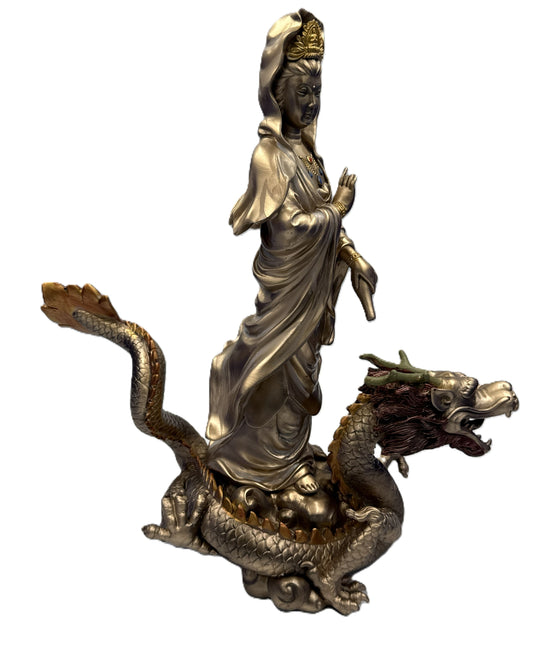 Front left view of Kuan Yin standing on dragon cold cast bronze statue detailed robes and spiritual guardian design
