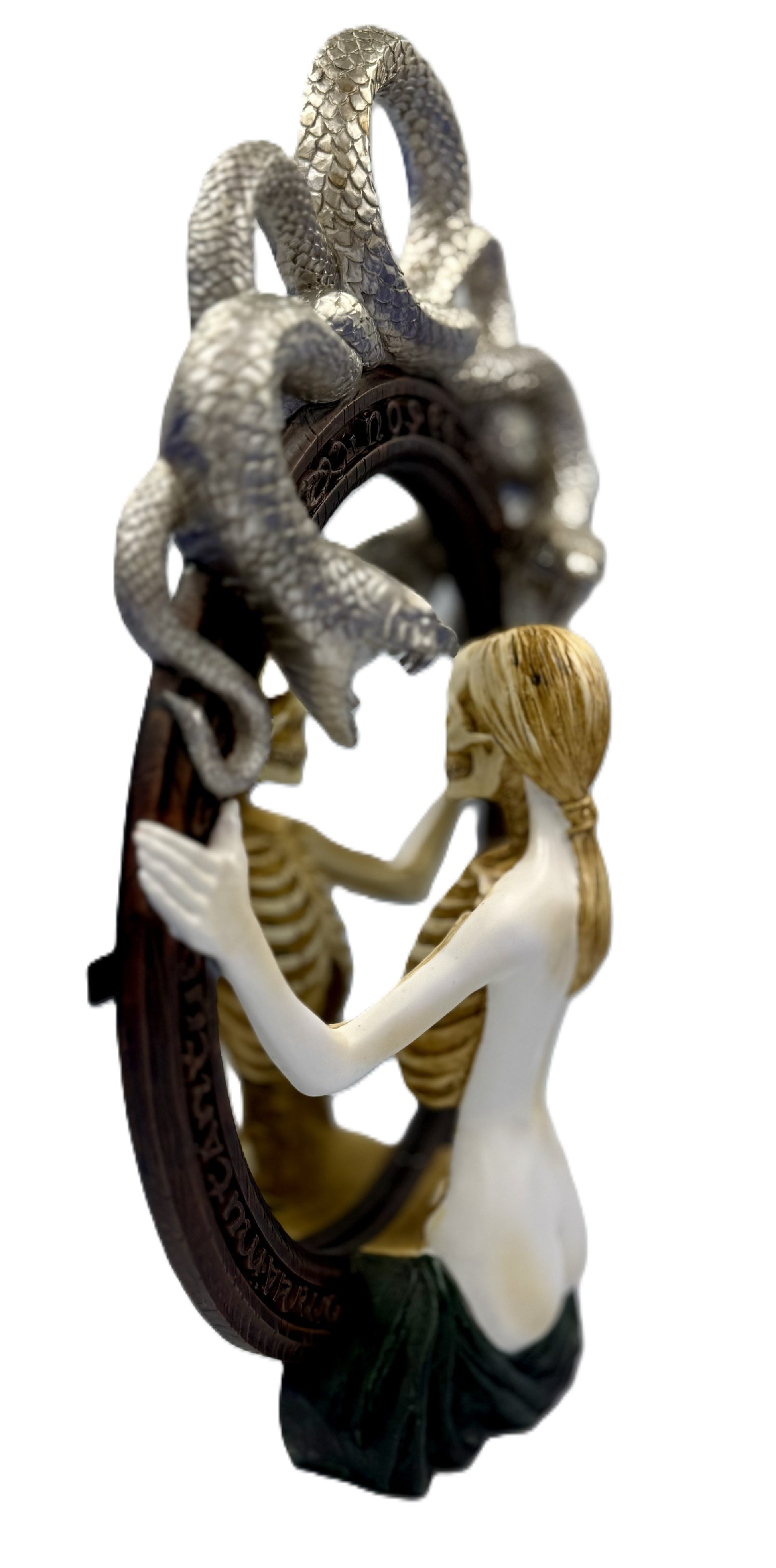 Angled side view showing depth of sculpted serpent frame and mirror design
