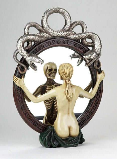 Front view of gothic mirror with woman and skeleton reflection framed by intertwined serpents
