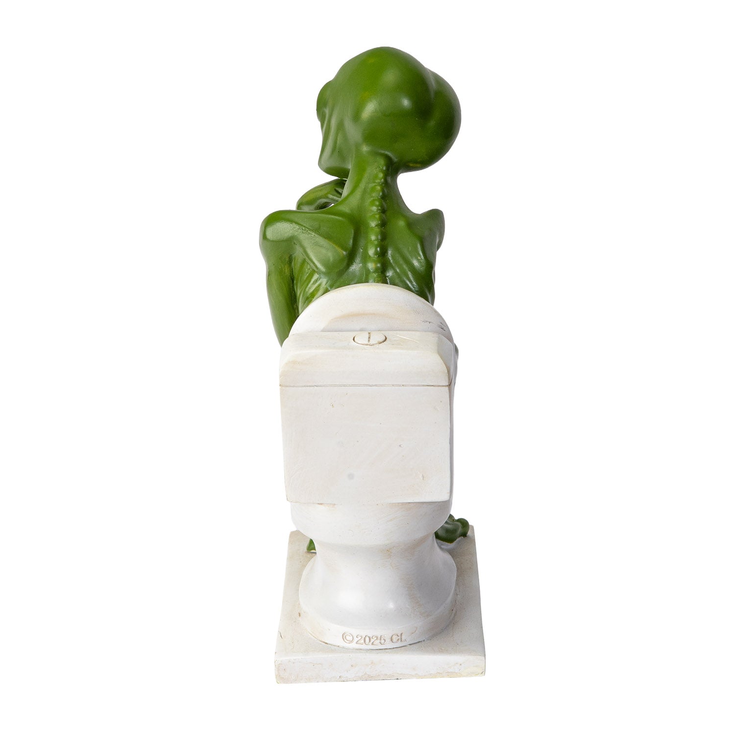 Back view of alien figurine showing spine detail and toilet base
