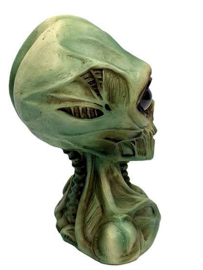 Side angle showing textured alien features and sculpted details
