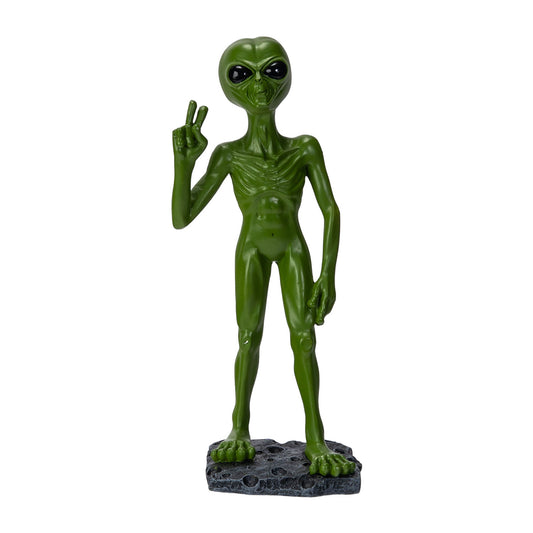 Front view of green alien figurine making peace sign
