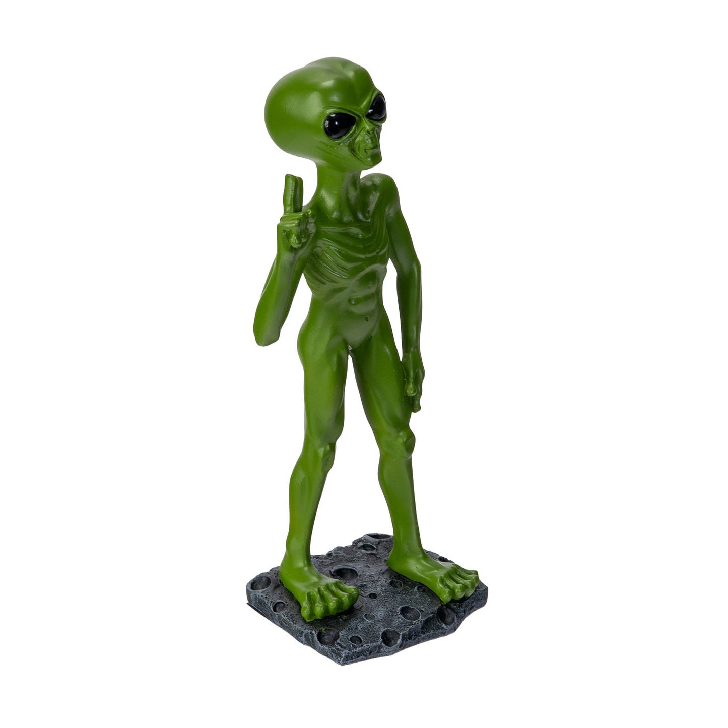 Side view of alien statue showing peace sign gesture
