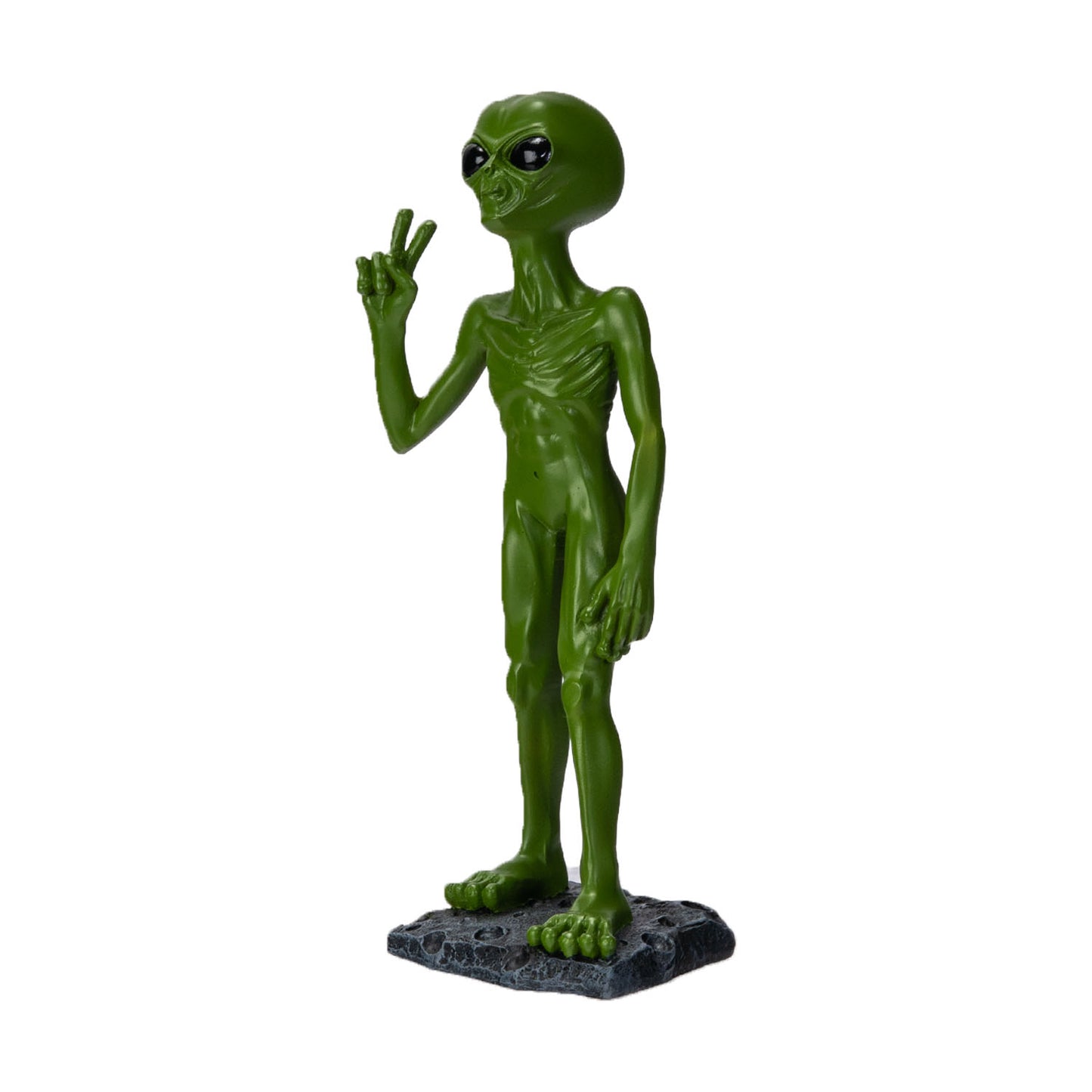 Side view of alien statue showing peace sign gesture
