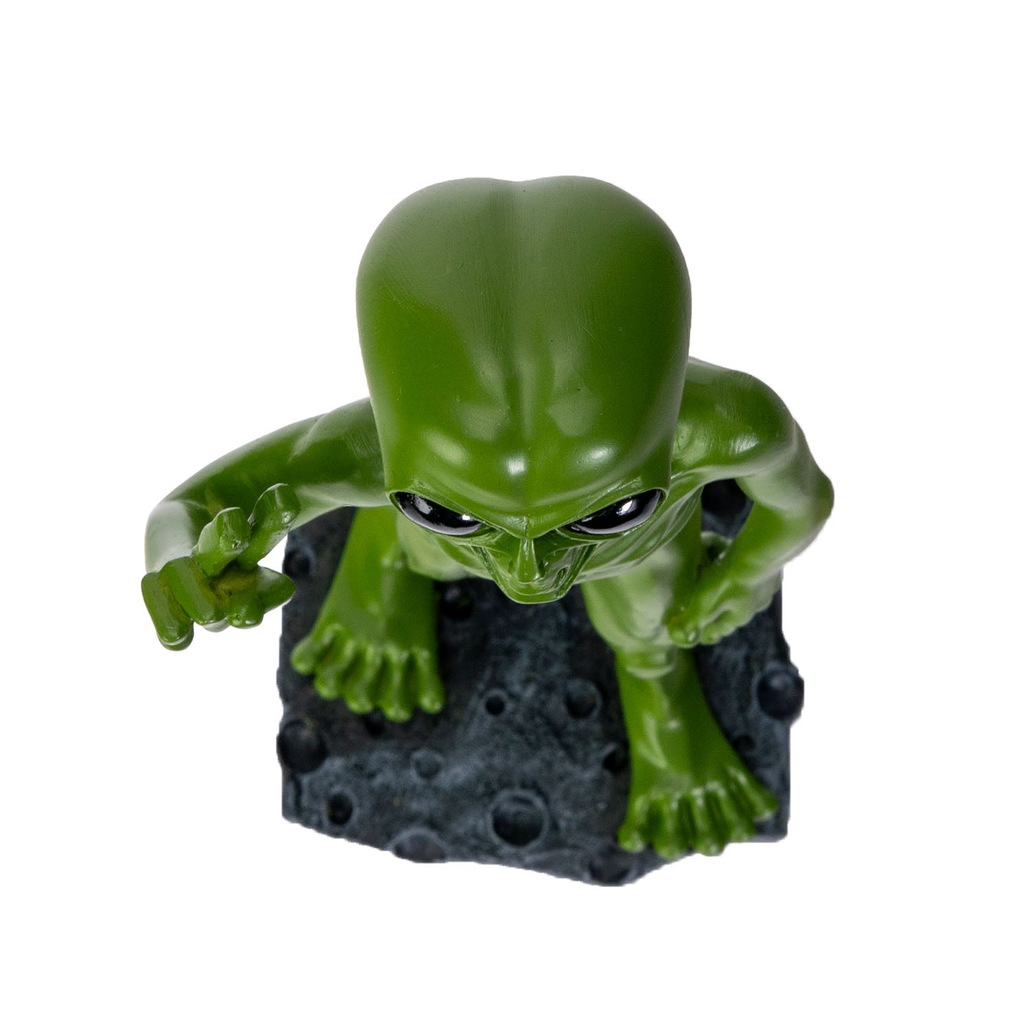Top angled view of alien figurine highlighting head and eyes
