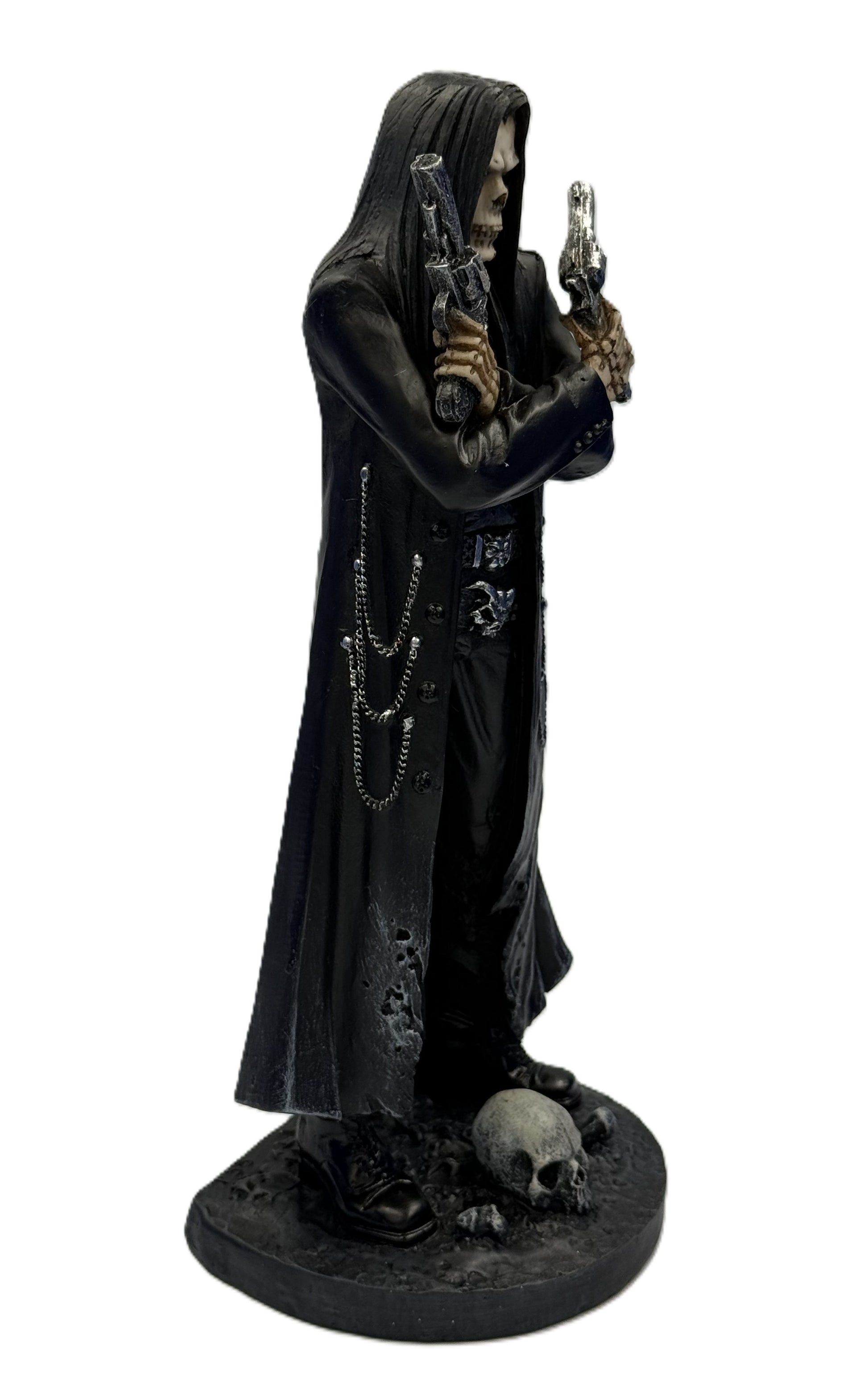 Angled view of assassin reaper figure highlighting skull face pistols and gothic styling
