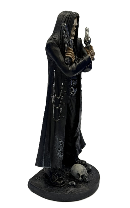 Angled view of assassin reaper figure highlighting skull face pistols and gothic styling
