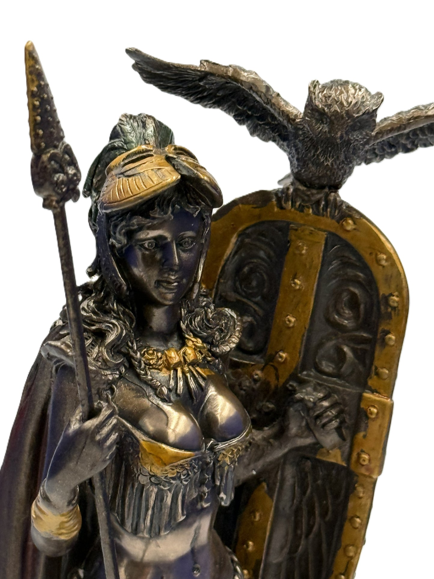 Close-up of Athena statue showing helmet, face detail, and owl perched on shield
