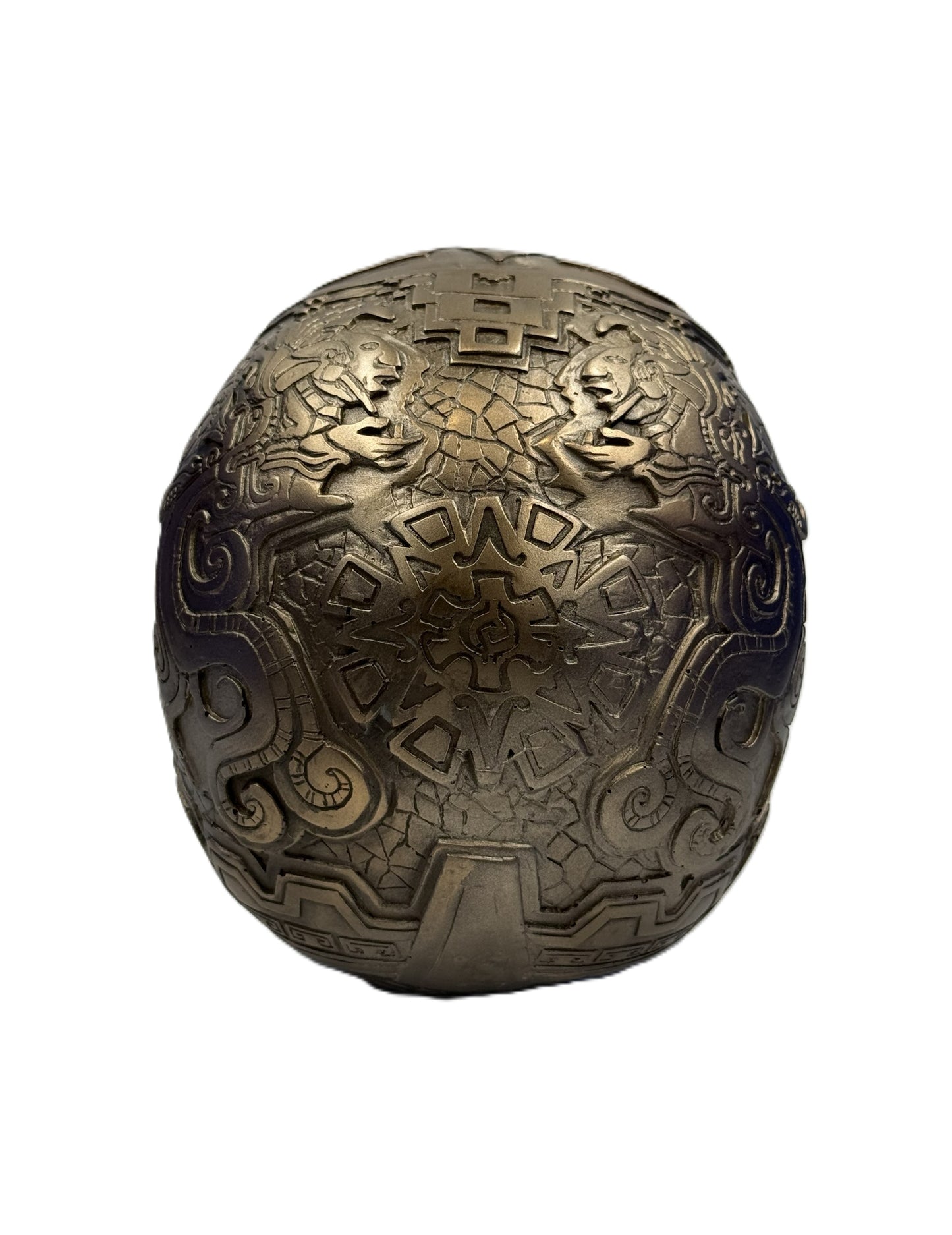 Back view of Aztec skull statue featuring symmetrical tribal patterns and textured bronze finish

