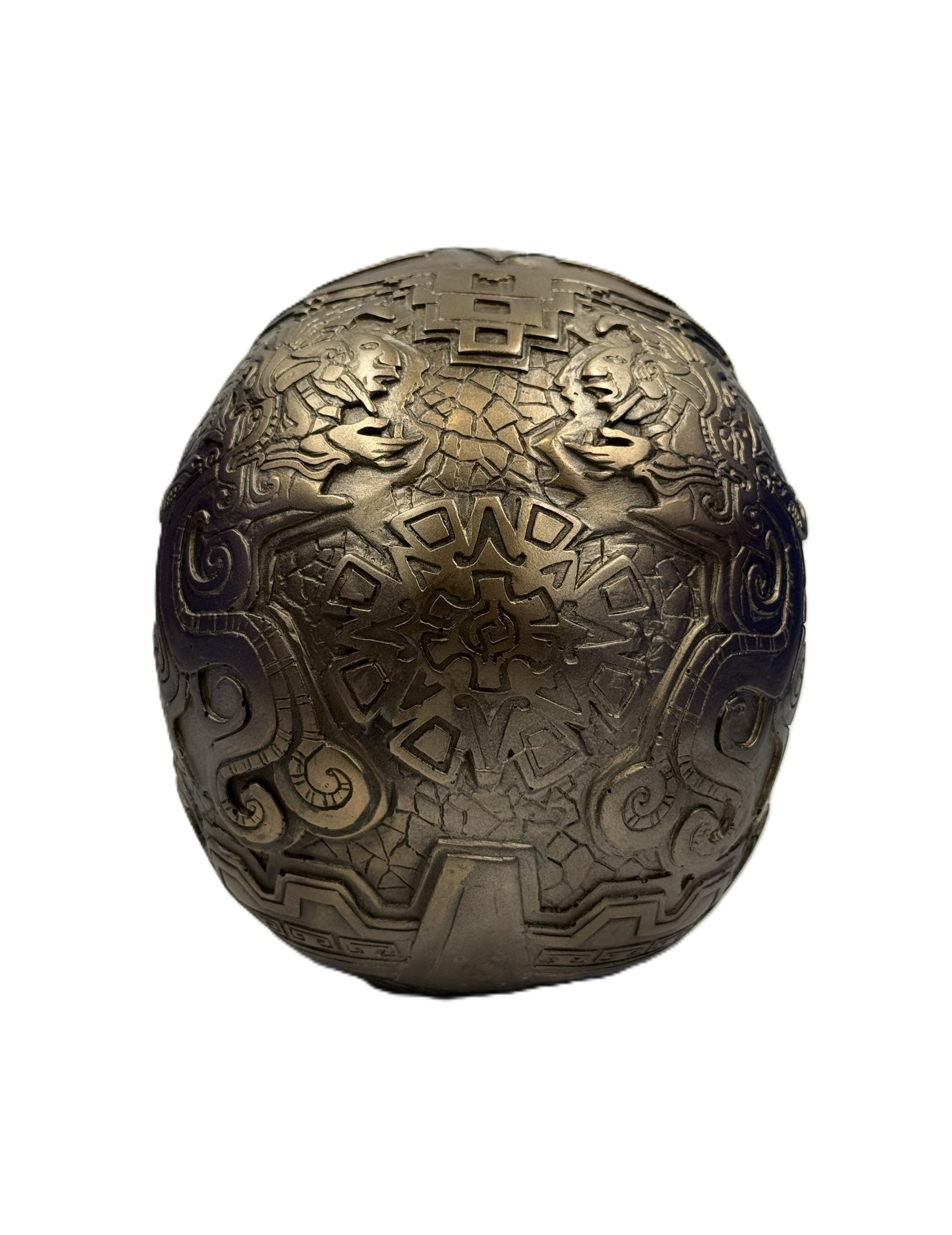 Back view of Aztec skull statue featuring symmetrical tribal patterns and textured bronze finish
