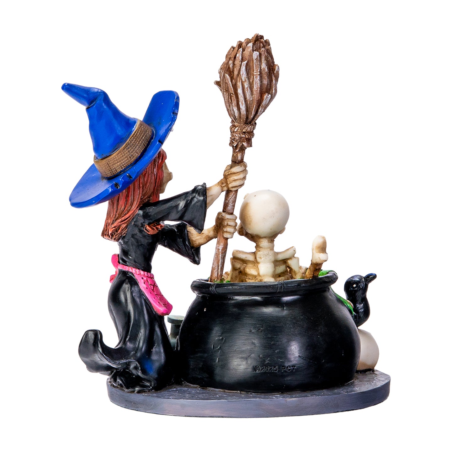 Back view of witch figurine showing broom stirring cauldron and detailed sculpt

