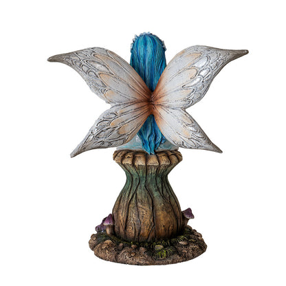 Back view of fairy statue showing textured wings and blue hair detail
