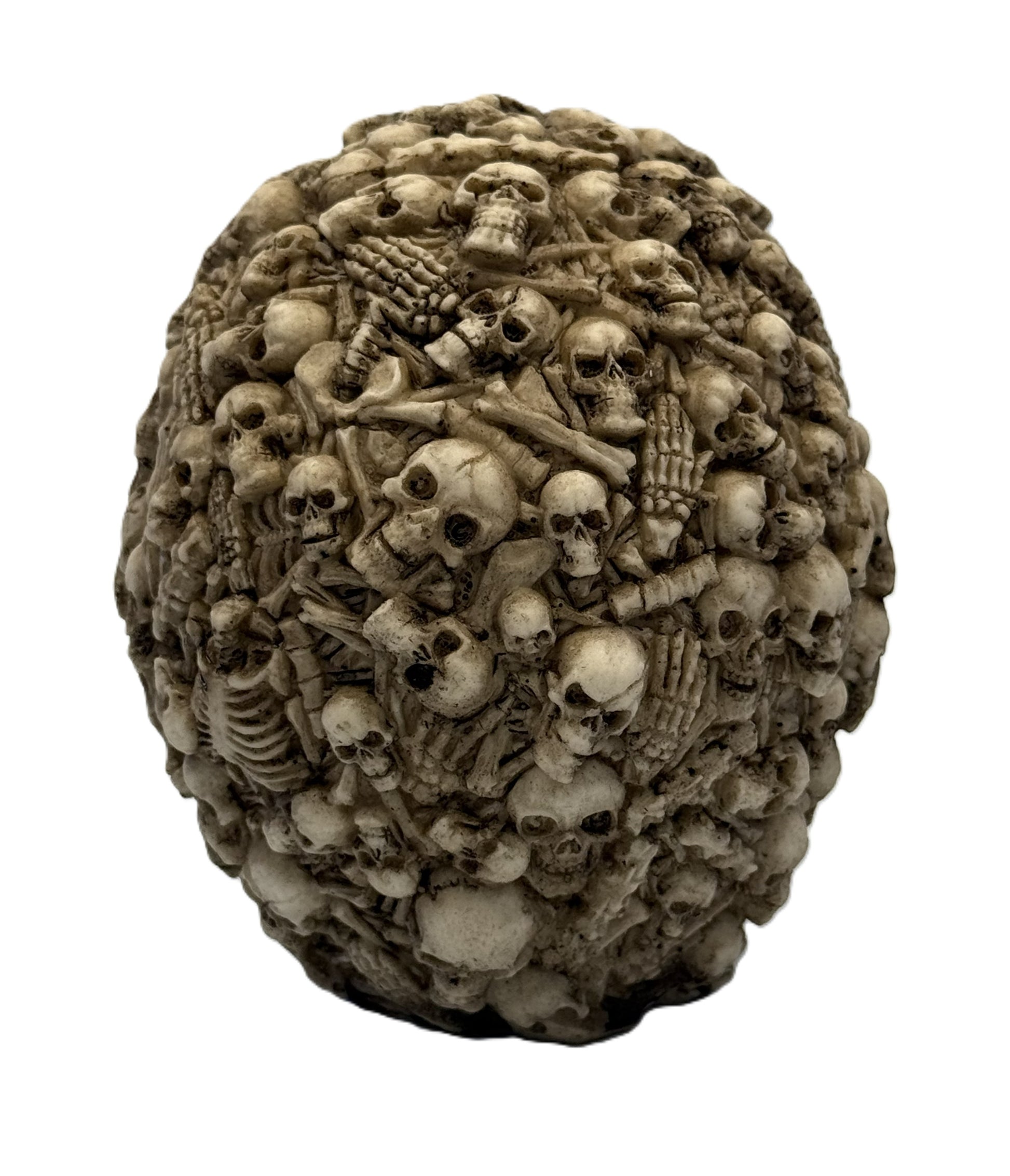Rear view of multi skull statue showing dense arrangement of bones and skulls in textured gothic design
