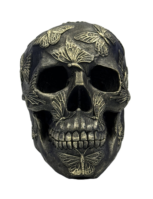 Front view of gothic butterfly skull resin statue with detailed butterflies covering the skull surface
