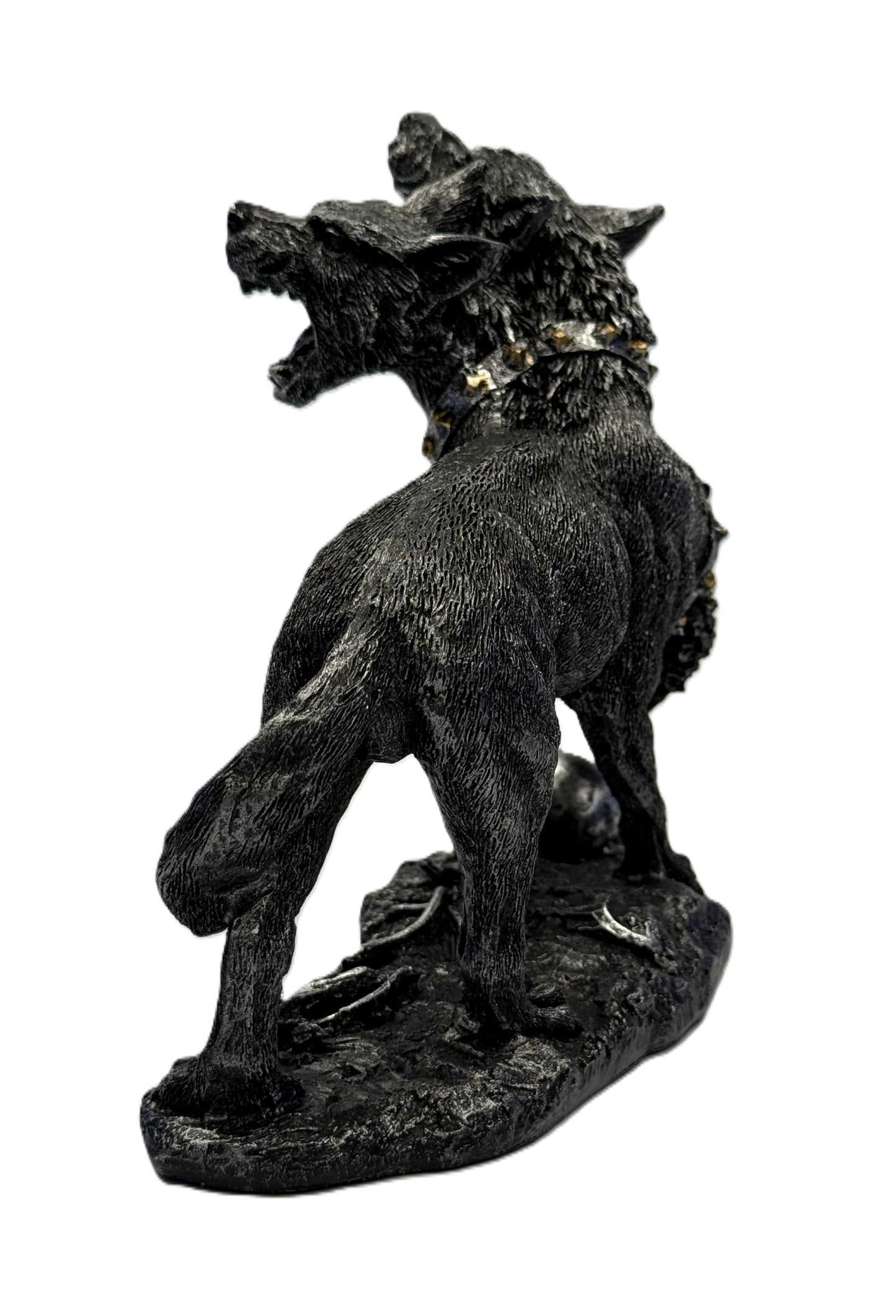 Back view of three headed Cerberus statue showing spine fur detail tail curve and gothic resin finish
