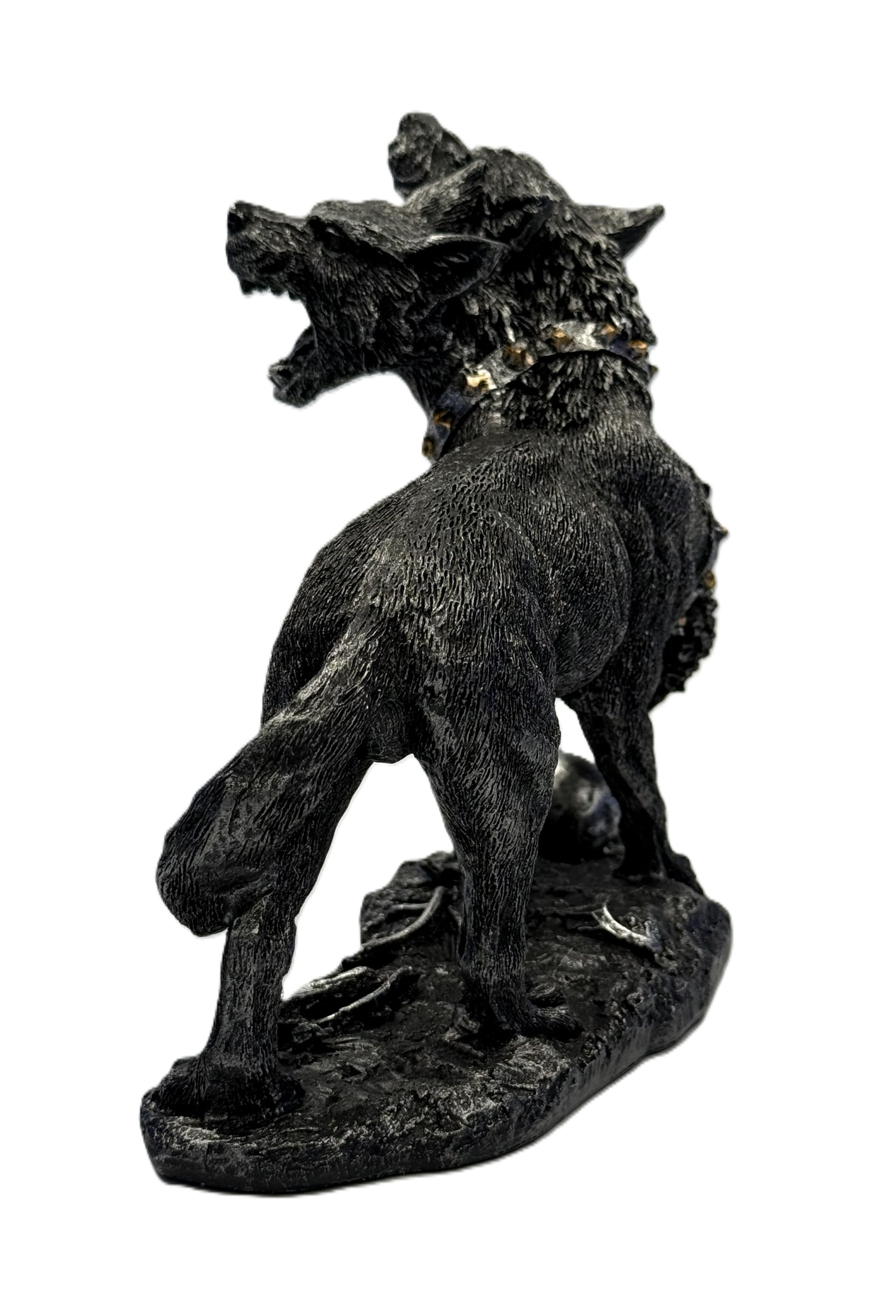 Back view of three headed Cerberus statue showing spine fur detail tail curve and gothic resin finish
