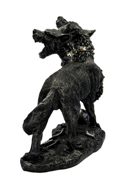 Back view of three headed Cerberus statue showing spine fur detail tail curve and gothic resin finish
