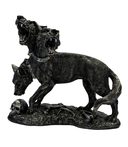 Left angled view of Cerberus statue showing three heads spiked collars and textured fur on gothic resin sculpture

