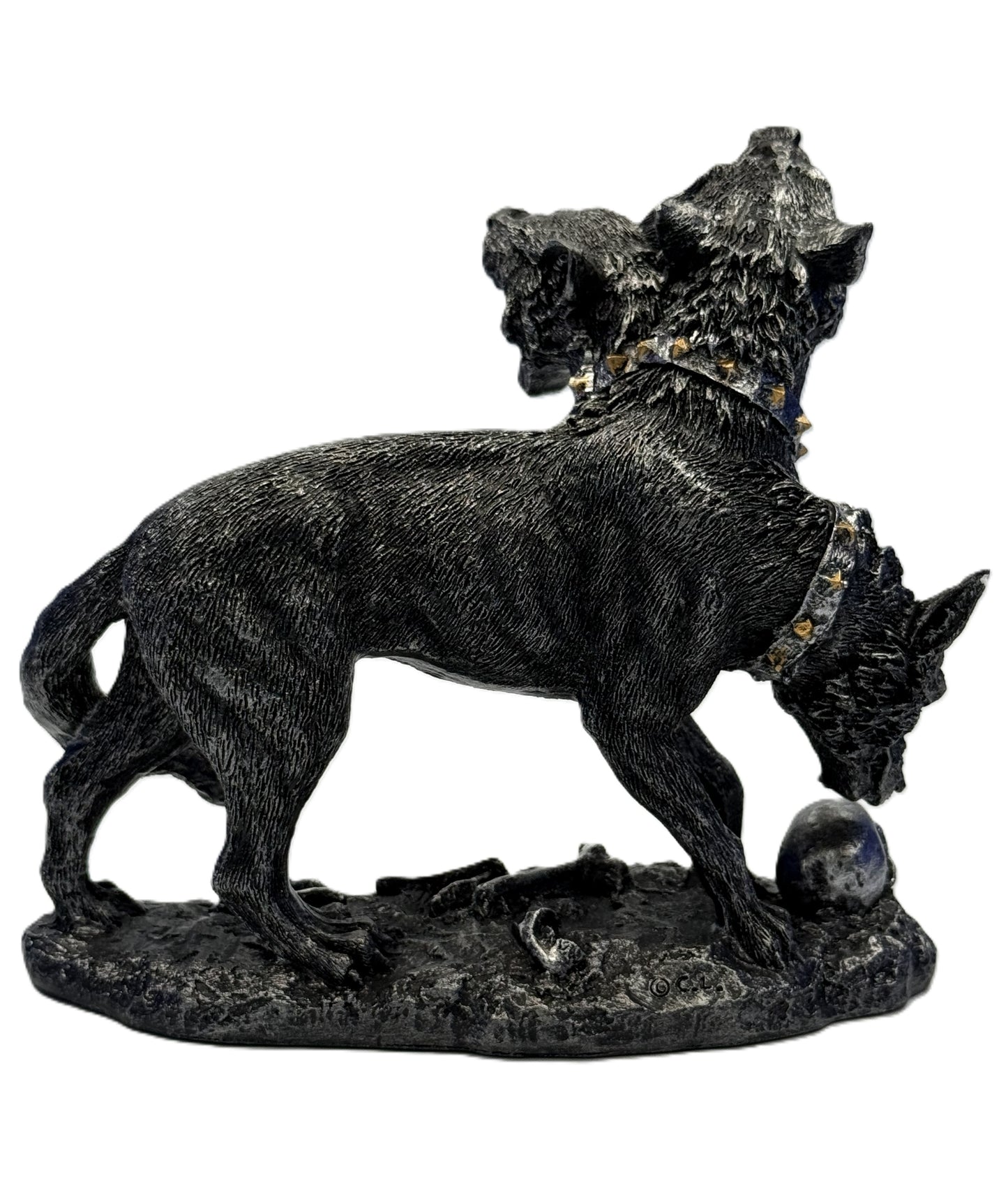 Right side view of Cerberus statue with lowered head skull base and textured ground detail in resin

