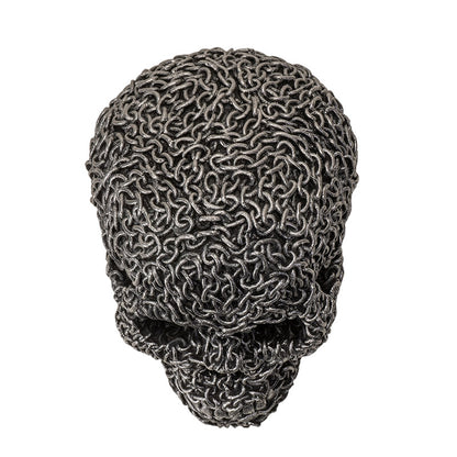 Top view of gothic chain skull sculpture highlighting dense chain pattern
