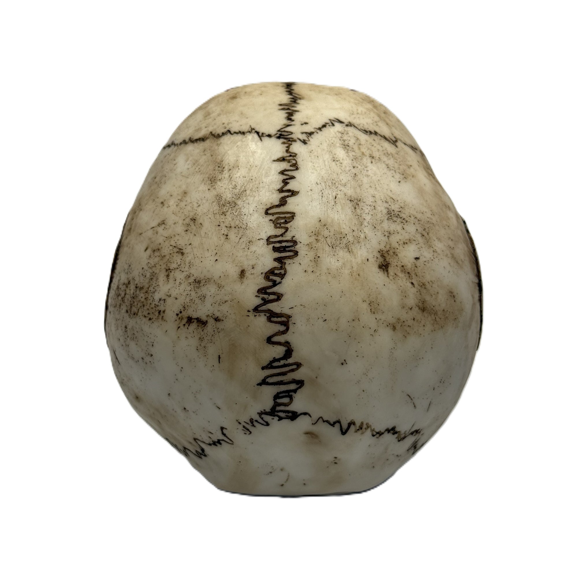 Back view of clown skull statue with detailed stitching pattern and aged bone finish resin decor
