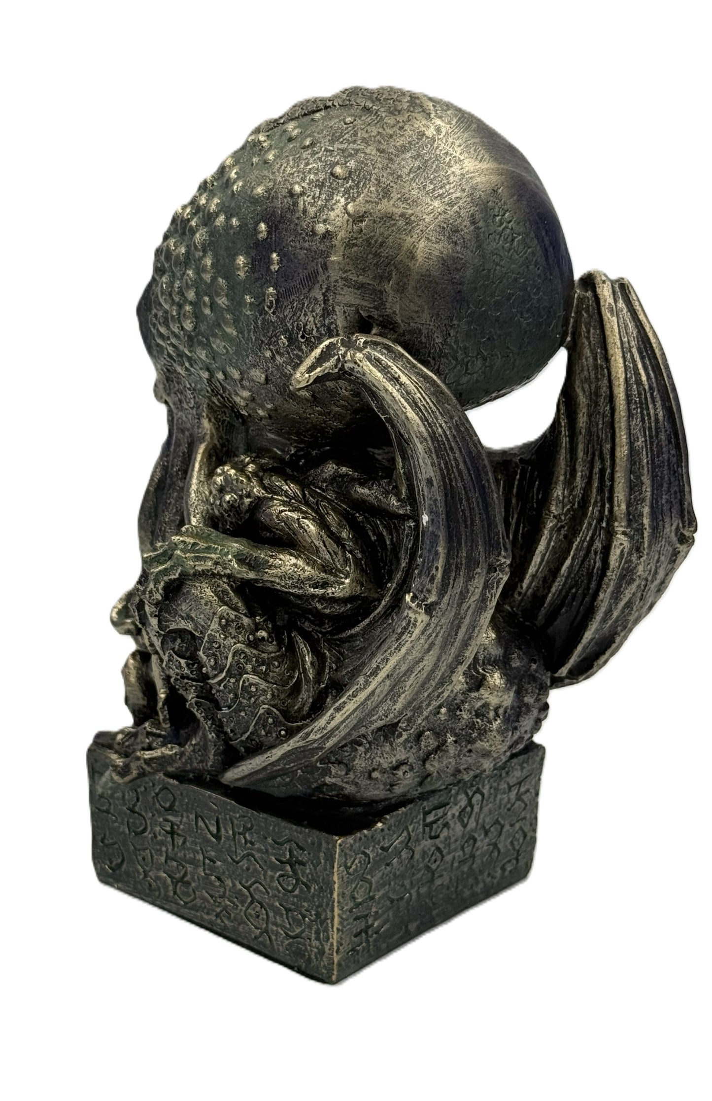 Left side view of Cthulhu statue highlighting wing structure tentacle details and aged bronze texture
