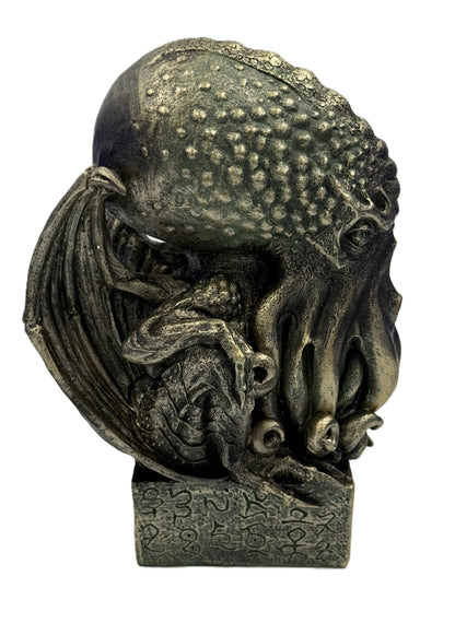 Right side view of Cthulhu figurine showing curled tentacles wings and sculpted horror detailing in bronze finish
