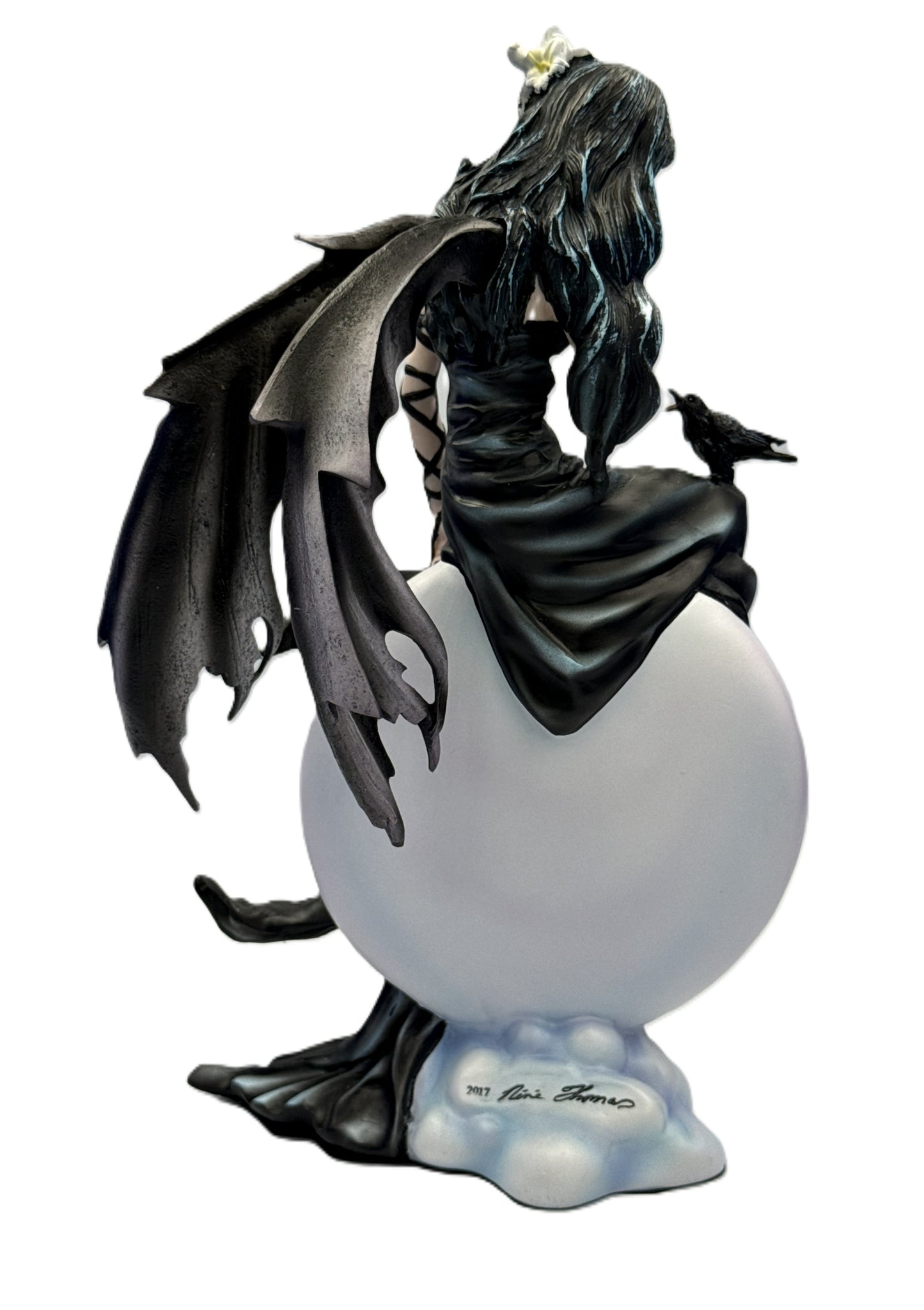 Rear angled view of gothic angel figurine showing wing details and elegant dress draping over orb
