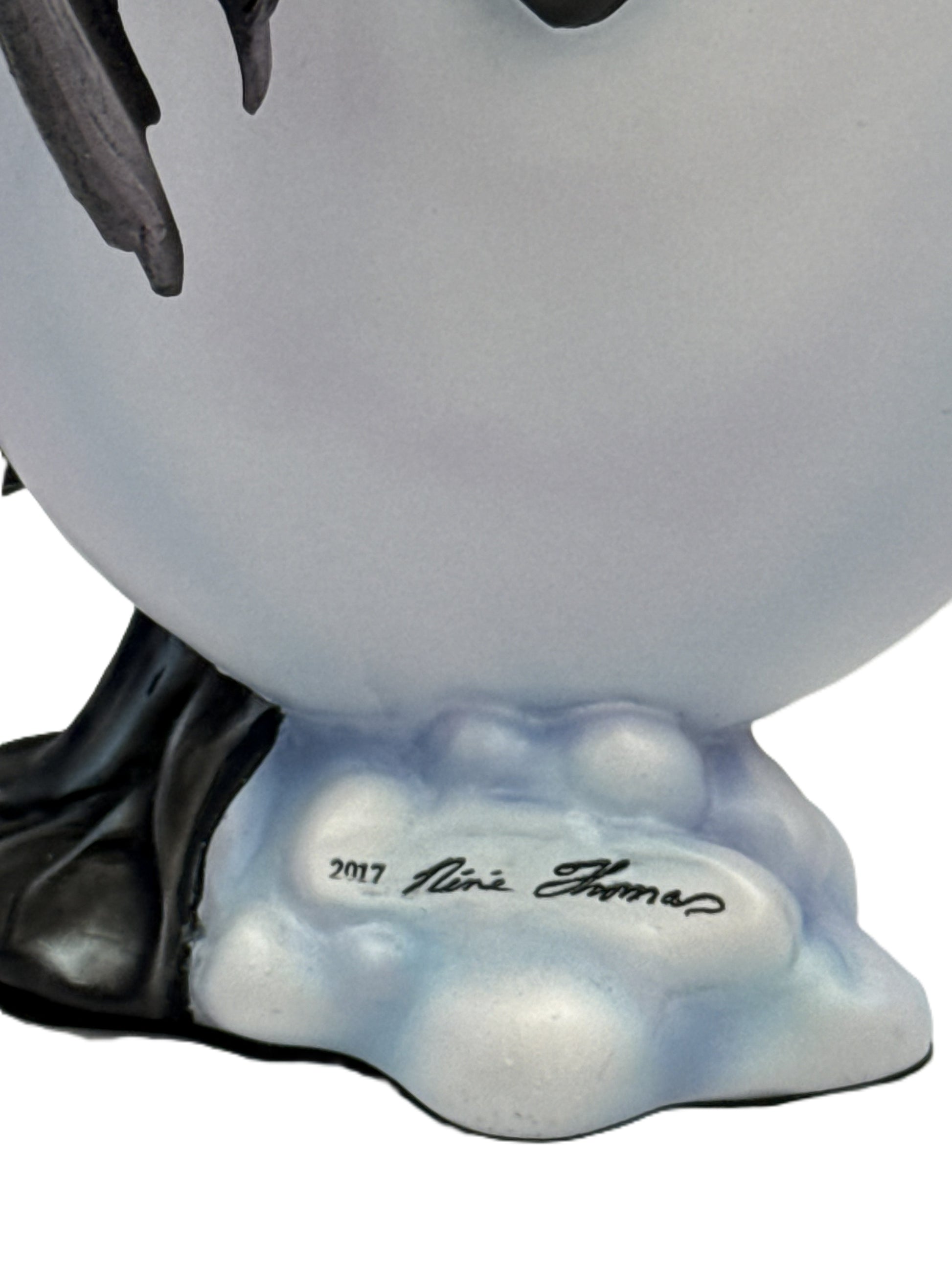 Close up view of the designer and year it was made
