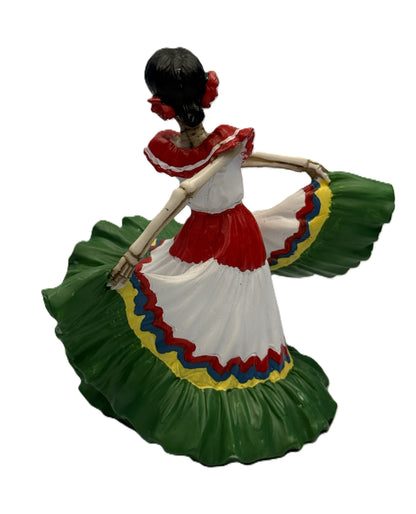 Back view of Day of the Dead señorita skeleton figurine showing dress movement and layered design resin statue
