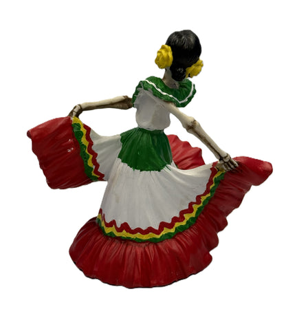 Back view of Day of the Dead señorita skeleton figurine showing dress movement and detailing resin statue
