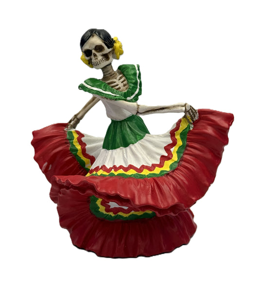 Front view of Day of the Dead dancing señorita skeleton figurine in red, green and white dress resin statue
