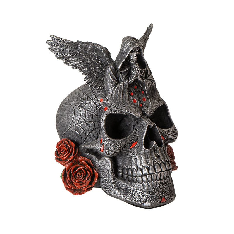 Angled view of gothic skull decor highlighting carvings and red accents
