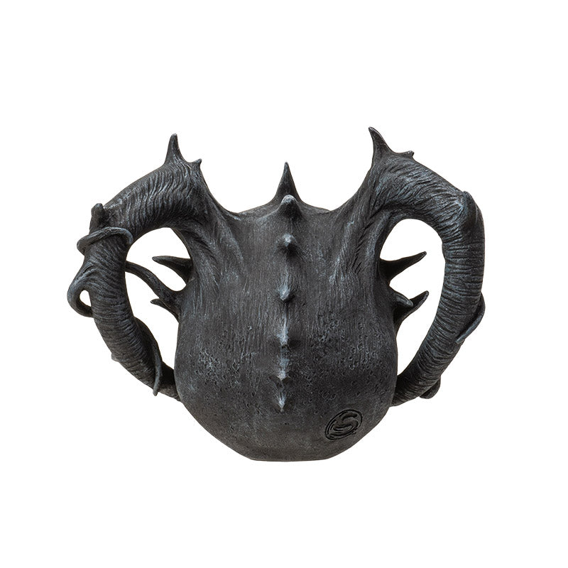 Back view showing curved horns and textured surface detail

