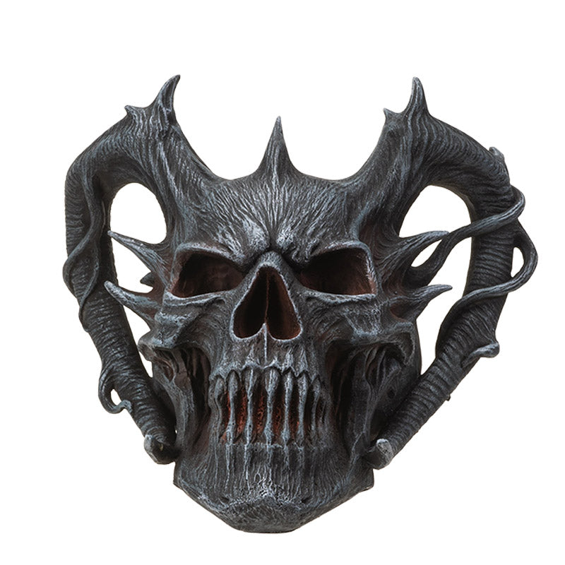 Front view of horned demon skull with sharp details and dark finish

