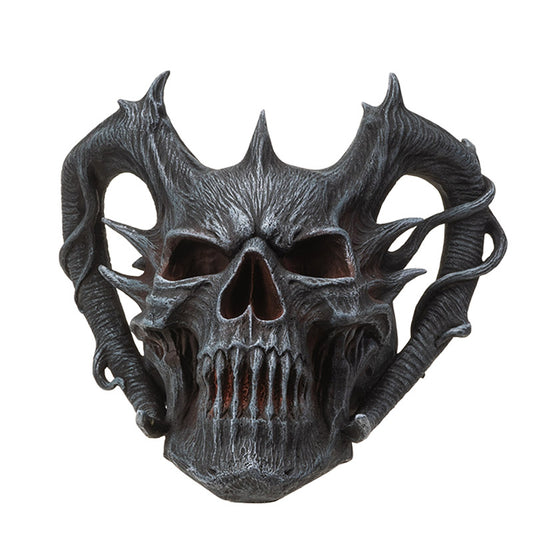Front view of horned demon skull with sharp details and dark finish
