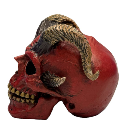 Left side view of horned demon skull decor showing textured horns and deep red hand-painted finish
