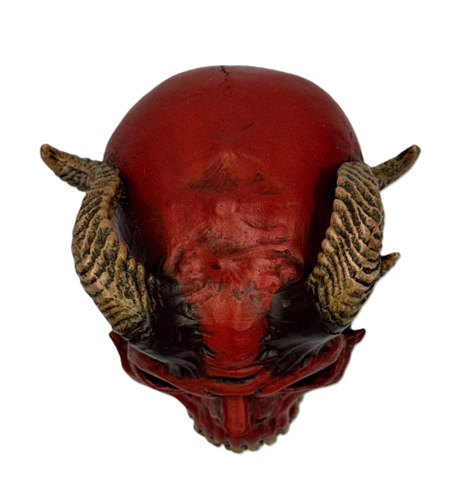 Top view of demon skull decor highlighting horn placement and sculpted ridges on the skull surface
