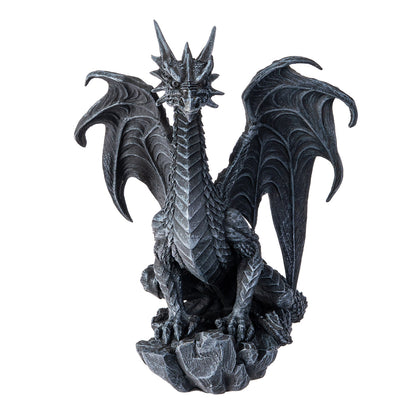Front view of dragon statue with symmetrical wings and fierce expression
