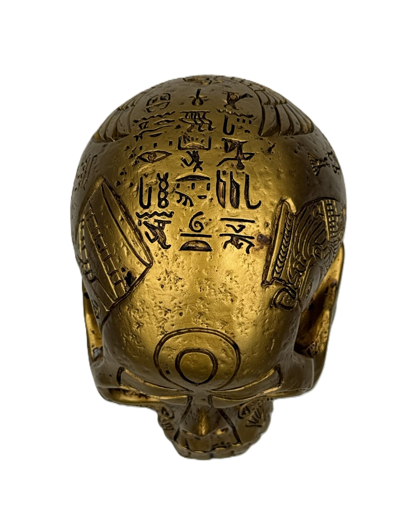 Top view of Egyptian skull decor featuring detailed hieroglyph inscriptions and ancient Egyptian symbols
