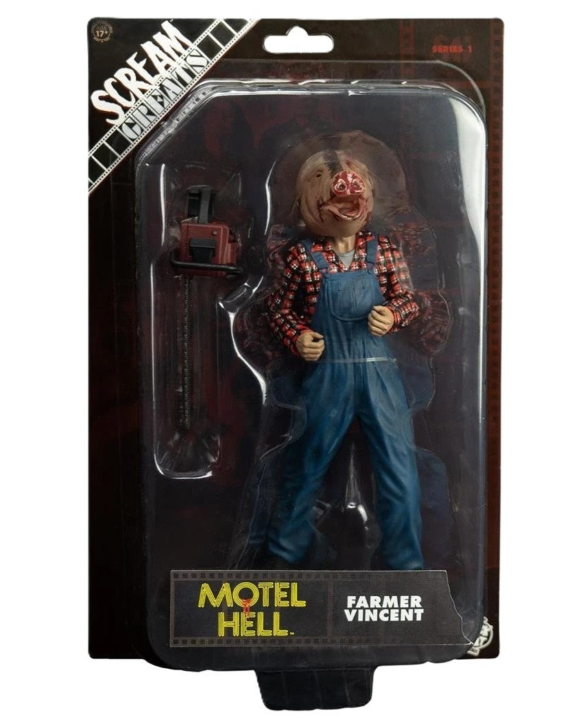 Front view of Farmer Vincent figure in packaging with pig head mask and chainsaw accessory
