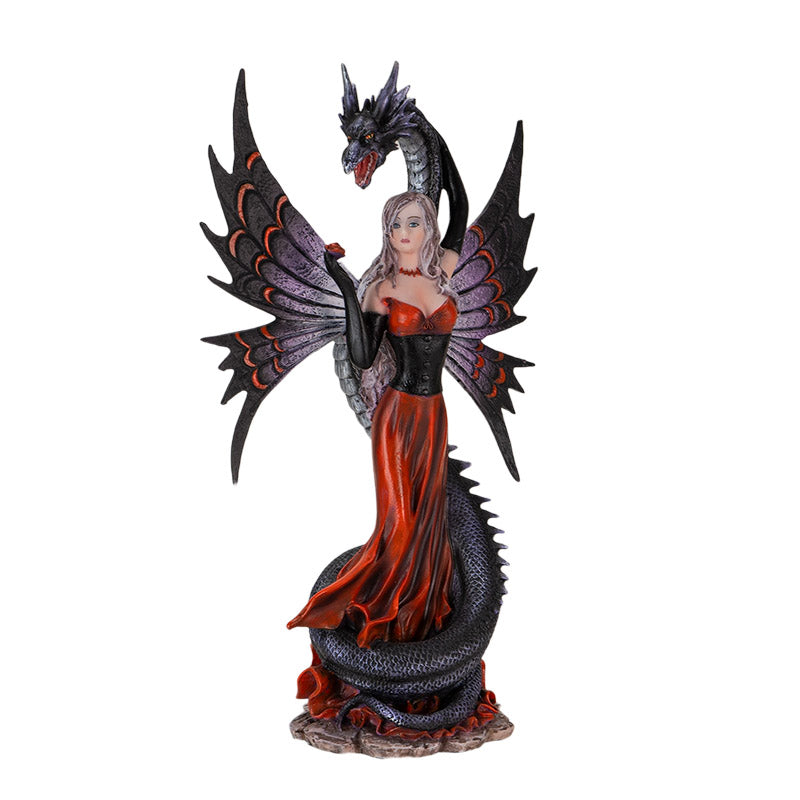 Angled view of fairy with dragon statue highlighting dress and wing details
