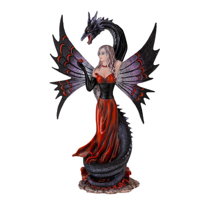 Front view of gothic fairy with dragon statue featuring wings and red dress
