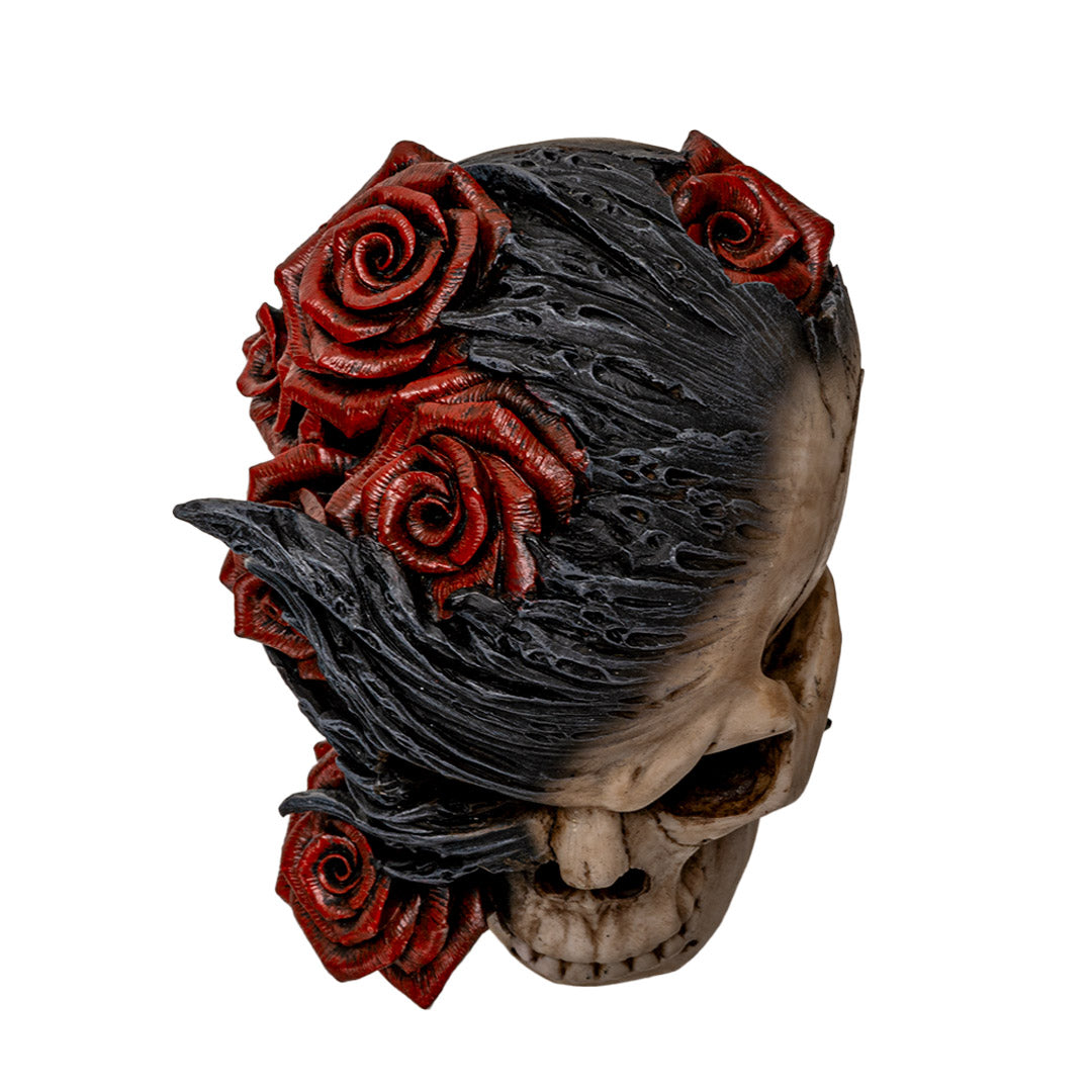 Top angle view of resin skull highlighting roses and flame sculpting
