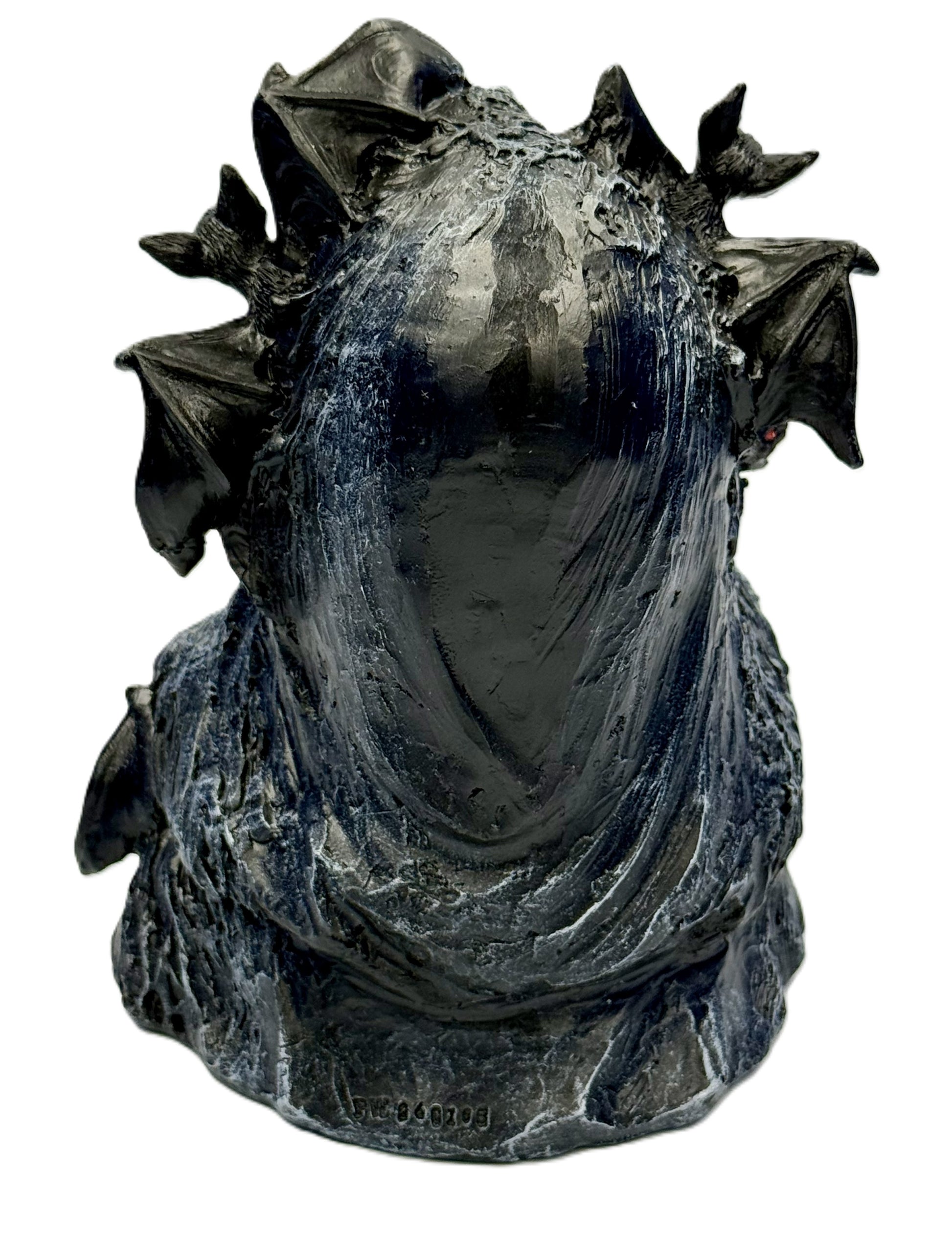 Back view showing flowing cloak texture and sculpted details
