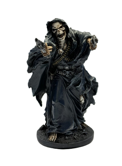 Close front view of grim reaper gunslinger showing skull face, bandolier, and dual revolvers in action pose
