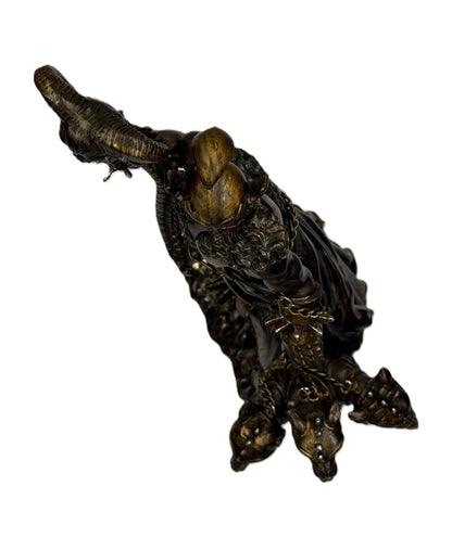 Top view of Hades statue showing helmet, staff, and Cerberus heads from above
