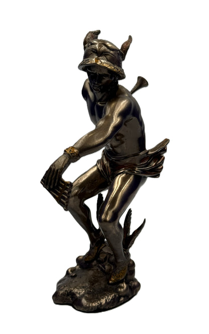 Angled view of Hermes statue showing muscular form, winged helmet, and detailed sculpting in bronze finish
